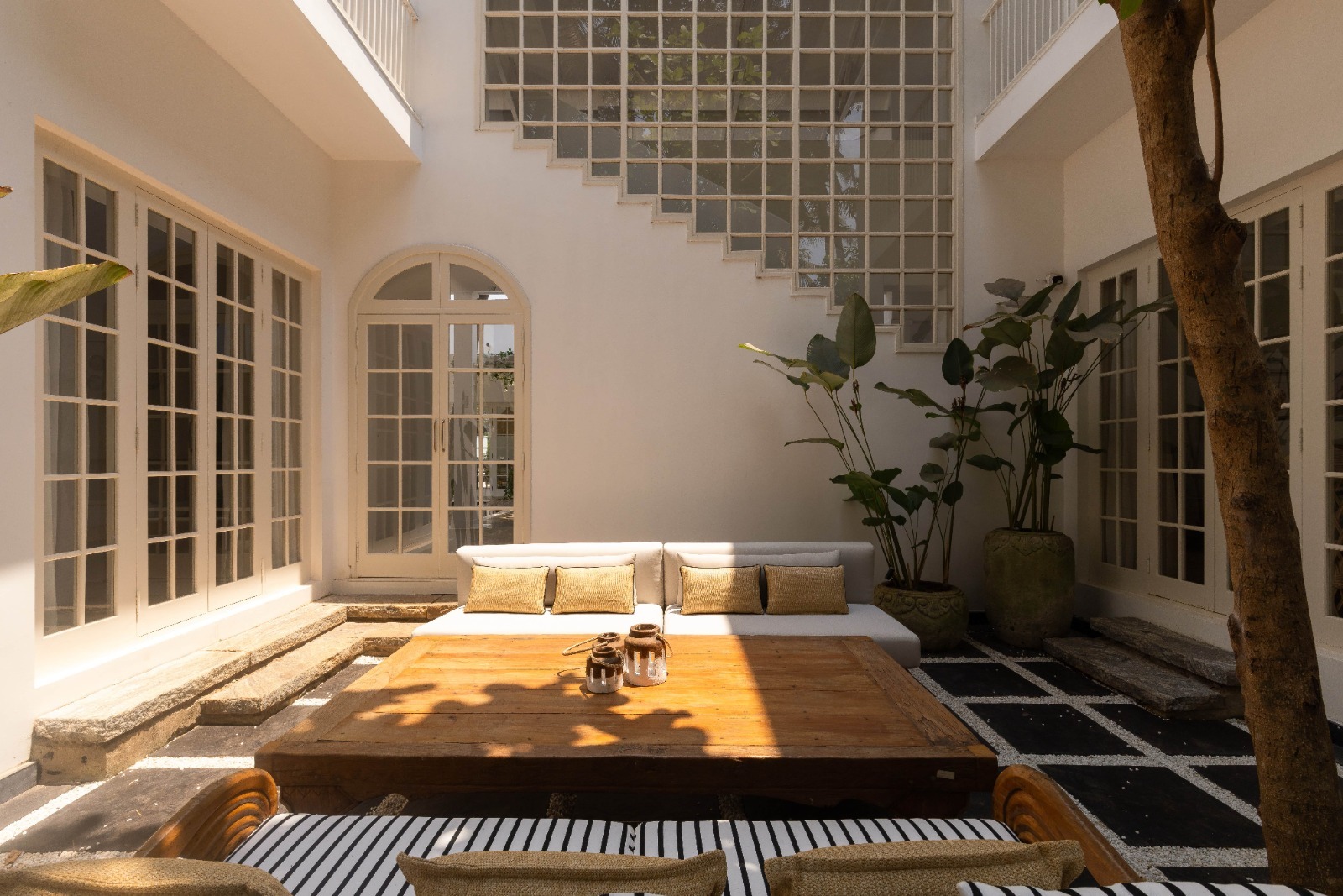 Villa Selene's brightly lit Conversation Pit in the courtyard of the house_Sahil Fauzdar and Rishul Bangar